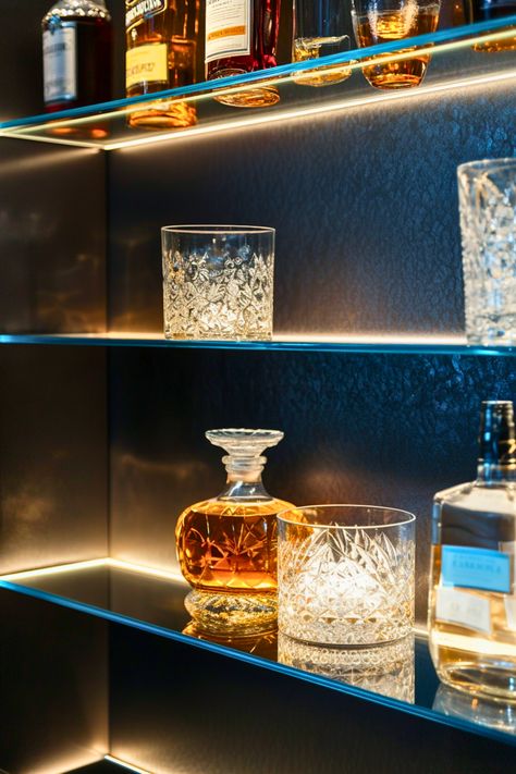 Want to make your home bar shine? Tempered glass bar shelves paired with LED lighting create a glowing, elegant display for your bottles and glassware. I’m all about the modern and airy feel this setup adds to any home bar. It’s perfect for tiny home bars or modern living rooms where you want to make a statement. Why not add a touch of glam to your bar area? Glass Shelves For Bar, Led Glass Shelves, Glass Bar Shelves Ideas, Glass Shelves Bar, Diy Bar Shelf Ideas, Diy Bar Shelves, Ideas With Led Lights, Home Bar Shelf, Glass Bar Shelves