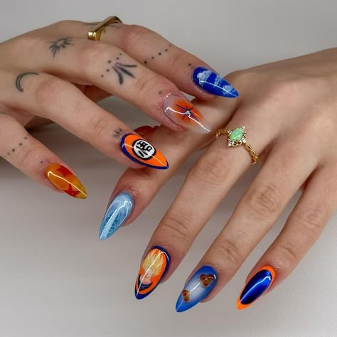 Faith Newlands on Instagram: "Dragonball Z nails on myself🤭 I asked Hayden what I should do for my nails this week and he said Dbz😂🐉🟠 so here we are. I’m so proud of these. Everything is hand painted (no stickers)!!! So excited to keep growing with my nail art and I can’t wait to be able to do sets like these for clients!!  #dragonballznails #dragonballnails #dbznails #dragonballzart #animenails #animenailart #nailinspo #nailinspo2024 #clarksvillenails #clarksvillenailtech #nashvillenails #nashvillenailtech" Dragon Ball Z Nail Art, Dragon Ball Nails, Orchid Nails, Fruit Nails, 3d Flower Nails, Anime Nails, Gel Mani, Keep Growing, Crazy Nails