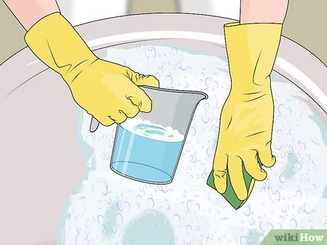 How to Wash a Wool Coat: 15 Steps (with Pictures) - wikiHow White Wool Coat, Woolen Clothes, Diy Coat, Black Wool Coat, Dry Cleaners, Fleece Coat, Clean Hands, Me Clean, Diy Cleaning Products