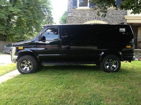 Up for sale is this custom, black 1993 Ford E 250 cargo van with a Quigley lift kit installed and VERY LOW MILEAGE. Description from 2040-cars.com. I searched for this on bing.com/images 4x4 Van For Sale, Ford Custom Van, Custom Vans For Sale, Ford Van Conversion, Lifted Van, Cargo Vans, Chevy Van, Build A Camper Van, 4x4 Van