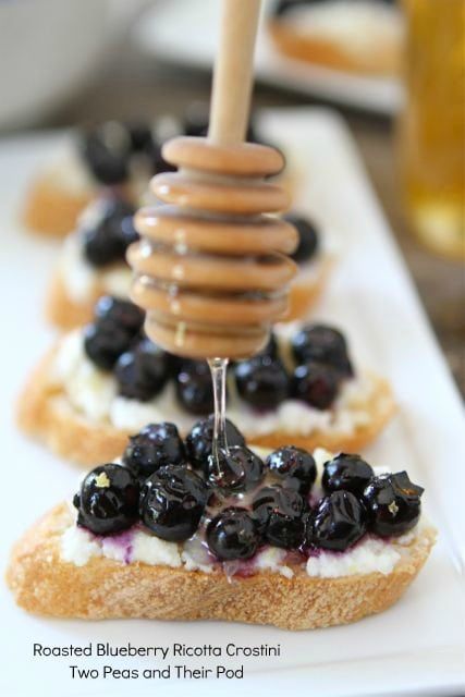 Roasted Blueberry Ricotta Crostini | Two Peas and Their Pod #recipe Blueberry Crostini, Blueberry Ricotta, Ricotta Crostini, Crostini Appetizers, Crostini Recipes, Elegant Appetizers, Blueberry Recipes, Sweet Food, Japan Food