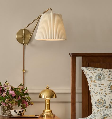 Inspired By French Lighting Designs, Eden Features A Slender Swing-Arm Paired With A Classic Smooth Or Pleated Linen Shade. Bed Side Lighting Ideas, Bedside Scones, Bed With Sconces, Light Sconces Bedroom, Bedroom Sconces Bedside, Nyc Rooms, French Lighting, Bedroom Upgrade, Bed Lamp