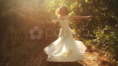 Woman Spinning Dress Slow Motion Nature Sun Forest Happiness Stock Footage #AD ,#Slow#Motion#Woman#Dress Woman Spinning In Dress, Spinning Dress Reference, Spinning In Dress, Spinning Dress, Photoshoot Inspo, Woman Dress, Nature Gif, Wedding Vector, Slow Motion