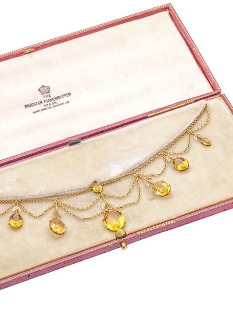 A pretty red antique necklace box. Housing an incredible antique French 18ct Gold Citrine festoon necklace radiating warm and sunny hues from both the Citrine and the Gold, making for an exquisite Victorian necklace! At Lillicoco Festoon Necklace, Victorian Necklace, Antique Boxes, Antique Necklace, Necklace Box, Sustainable Jewelry, Antique Jewellery, Vintage Jewellery, Antique Vintage