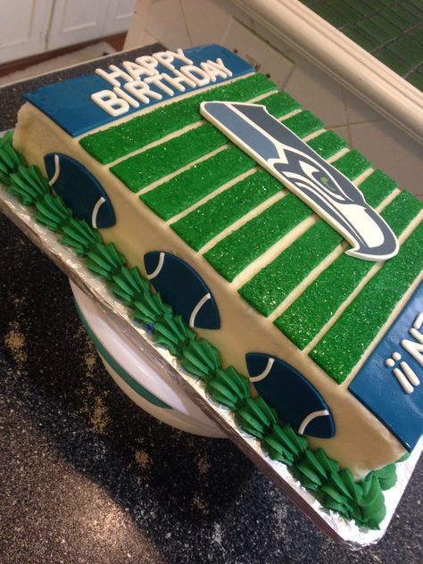 Side view Seahawks cake Seahawks Cake Ideas, Seahawk Cake, Seahawks Cake, Seahawks Party, Football Birthday Cake, Football Banquet, Smash Cakes, Candy Birthday, 3 Birthday