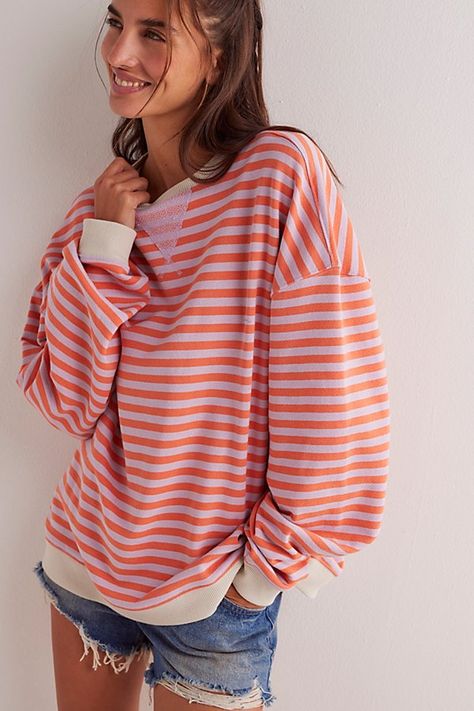 So cool and classic, this timeless crewneck is featured in an oversized, slouchy silhouette and staple striped print with contrasting hems for added dimension. **Fit:** Relaxed, oversized fit **Features:** Crew neckline, dropped shoulders, contrast hems **Why We | Classic Striped Oversized Crewneck by Free People in Pink, Size: M Free People Decor, Free People Style, Oversized Crewneck, Sweatshirt Short Sleeve, Cute Everyday Outfits, Free People Sweater, Cute Sweaters, Fall Fashion Outfits, So Cool