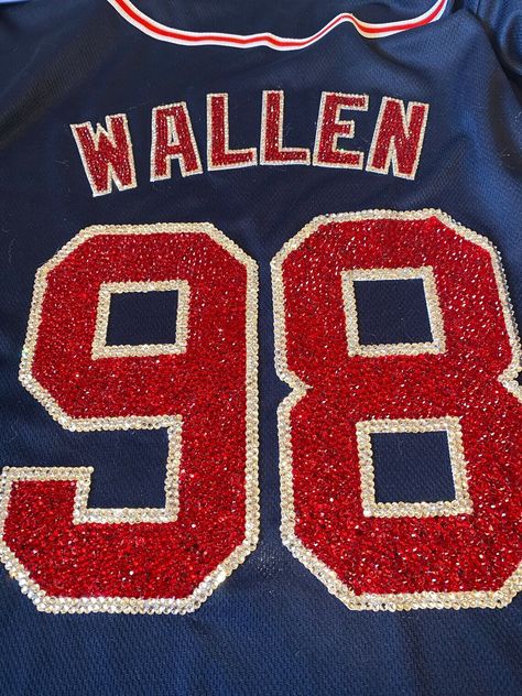 Morgan Wallen 98 Braves Rhinestone Jersey!   Sizes Small, XL and  2XL available Morgan Wallen Merch, Morgan Wallen Jersey, Rhinestone Jersey, 98 Braves, Zach Bryan Quotes, Braves Jersey, Braves Shirts, Best Country Singers, Country Music Concerts