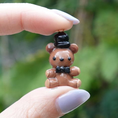 Little Freddy Fazbear 🐻 These are up on my shop! ✨ - ✨ - ✨ - ✨ - #polymerclay #axolotl #etsy #smallbusiness #clayart #clay #sculpture #gamingart #girlartist #kawaii #chibi #keychain #pokemon #bugs #rdr2 #fnaf Clay Chibi, Minecraft Clay Charms, Axolotl Clay, Clay Axolotl, Clay Pokemon, Jewelry Template, Clay Keychain, Girl Artist, Clay Diy Projects