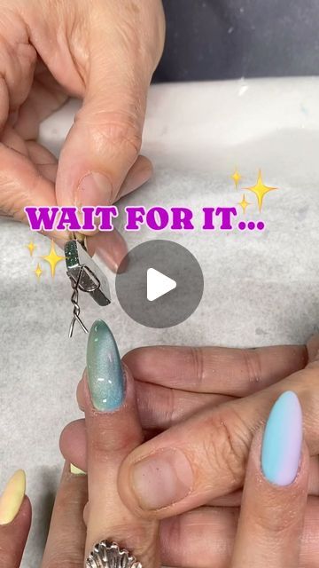 KANDEE JOHNSON🍭 on Instagram: "🧲⚡️❤️How mesmerizingly cool are these “magnetic cat-eye, pastel ombré, silver twinkle & baby pearl” nails?!?  Mind blowing & genius nail artistry by the Queen herself, nail artist extraordinaire: @sohotrightnail   She twisted a paper clip and magnetized it to these other 2 magnets she holds onto, then after painting cat eye polish on she used the magnets to pull the metallic sparkle bits in opposing directions to create a heart shape: 🤯   (Insert my mind being blown with each nail she did)  She has a tutorial for it on her page I believe! 🙌💅🙌  Bel AKA @sohotrightnail always blows me away with her skills!  #nails #nailart #nailartist #heartnails #cateyenails #magnetic #naildesign #viral #naildesign #nailsofinstagram #valentines #valentinesnails" Magnetic Nail Polish Designs, Cat Eye Polish, Kandee Johnson, Magnetic Nail Polish, Cat Eye Nails Polish, Nails Board, Magnetic Nails, Eye Nails, Painting Cat