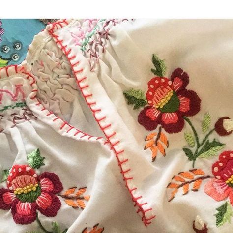 Kasia Jacquot on Instagram: "Rich. Vibrant. Happy. That’s what traditional Polish embroidery is for me and this is how I remember my childhood growing up in a small village. Here are three photos to get you inspired. . The first photo is a blouse which was a gift from my late grandmother Halinka. I love the embroidery on this, it’s so rich and colourful without looking tacky. . The second photo is of my “Ania” pattern which was inspired by the traditional design indigenous to the Krakow region in Poland. This is the pattern and style I will be teaching in my workshop next Tuesday in lane Cove. I have a couple of spots left and the link is in my bio if you’re keen. . The third photo shows the “Ania” pattern which will soon be available as a silk screen print. I have decided to change all my Laura Wasilowski Embroidery, Polish Folk Embroidery, Polish Embroidery Polish Art Center, Macedonian Traditional Embroidery, Polish Embroidery, Folk Style Ceremonial Embroidered Fabric With Motifs, Small Village, My Childhood, Silk Screen Printing