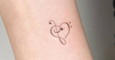 Treble clef Bass And Treble Clef, Clef Tattoo, Treble Clef Heart, Treble Clef Tattoo, International Tattoo, Music Keyboard, Heart Tattoos, Treble Clef, Tattoos Gallery