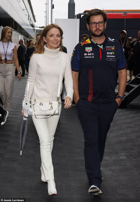 Glam: On Saturday, Geri once again showed off her signature style as she dressed in an all... White Denim Jumpsuit, Geri Horner, British Grand Prix, Florence Pugh, Cara Delevingne, Hornet, Denim Jumpsuit, Formula One, White Denim