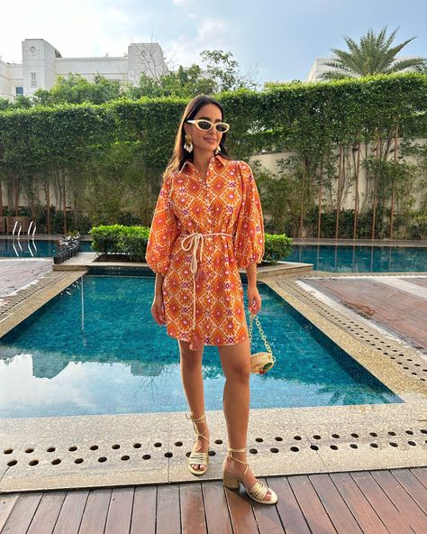 Beach babe alert! 🏖️ Dive into summer style with @arushi.mehra_, effortlessly rocking our Marmalade Mini Dress, the ultimate poolside chic ensemble that'll turn heads and make waves. - Spring summer. Warm hues. Colours of summer. Summer vacation. Resort style. Vacay fashion inspo. Summer dress. Beach vacation. What to wear to the pool. Beach cover up. Arushi Mehra, Fashion Inspo Summer, Summer Dress Beach, Make Waves, Pool Beach, Dress Beach, Resort Style, Marmalade, Beach Babe