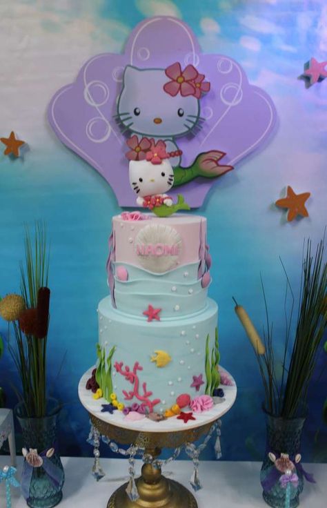 Don't miss this beautiful Hello Kitty Under the Sea Birthday Party! The birthday cake i amazing!! See more party ideas and share yours at CatchMyParty.com #catchmyparty #partyideas #hellokittyparty #undertheseaparty #hellokittycake Hello Kitty Mermaid Party, Hello Kitty Mermaid Cake, Kitty Party, Diy Hello Kitty, Sea Party Ideas, Mermaid Birthday Party Decorations, Hello Kitty Cupcakes, Hello Kitty Tattoos, Hello Kitty Birthday Party