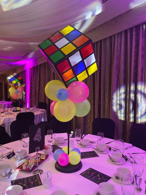 Rubik’s cube
80s party
table centrepieces 
neon balloons 90s Theme Party Table Decor, 80s Theme Table Centerpieces, 80s Party Table Centerpieces, 90s Table Decor, 80s Party Table Decor, 80s Table Centerpieces, 80s Theme Centerpieces, 90's Theme Centerpieces, 90s Table Decorations