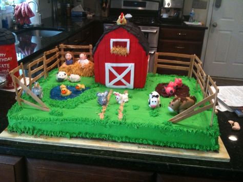 Barnyard Bash Birthday - Two 13x18 sheet cakes covered in Buttercream as farmland.  Mud made of chocolate icing, pond out of Wilton Sparkle Gel.  Barn and Silo made of RKT covered in Fondant.  All Animals(rooster, pigs, sheep, horse, cow, goat, ducks and bunnies) handmade of fondant.  Birthday Kids made of fondant playing in hay. Fencing made of Gumpaste.  First time making fondant figures and RKT buildings so glad it worked out. Fondant Chicken, Farm Themed Birthday Cake, Barnyard Birthday Cake, Old Macdonald Birthday, Farm Cakes, Old Mcdonald Had A Farm, Farm Birthday Cakes, Barnyard Cake, Barn Cake