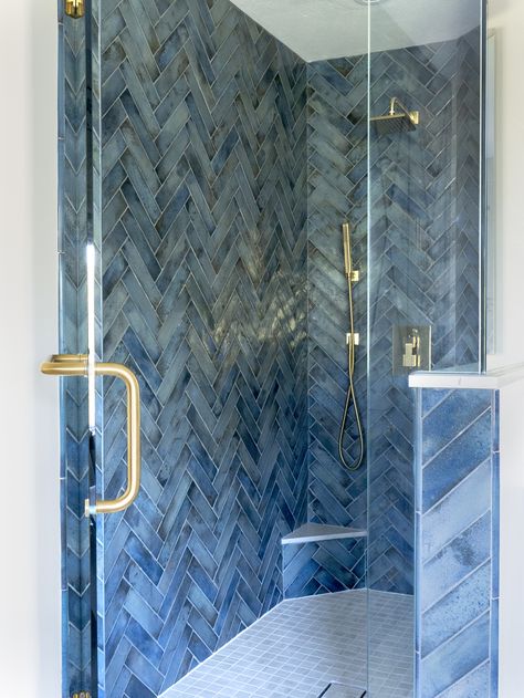 Want to add a pop of color into your bathroom design? Juliza Design Studio used a subway tile with a nice amount of variation and blue hues in this walk in shower. A great way to add color! Small Walk In Shower Ideas, Cabana Bathroom, Blue Tile Shower Ideas, Dark Blue Tile, Blue Shower Tile, Blue Bathroom Tile, Subway Tile Showers, Beach Bathroom, Glass Subway Tile