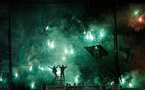 Panathinaikos' fans light flares after the cancellation of the Greek Super League match between Panathinaikos and Olympiakos at Apostolos Nikolaides stadium in Athens Snow In China, Lazy Frog, Athletic Wallpaper, Basketball Cupcakes, Ultras Football, Messi Photos, Paris Poster, Sports Marketing, Super League