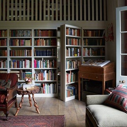 Discover bookshelf ideas on HOUSE - design, food and travel by House & Garden. This built-in bookcase equipped with a ladder also acts as a secret door to a hidden bathroom. Secret Door Bookshelf, Bookshelf Ideas Living Room, Dold Dörr, Reading Room Decor, Rustic Bookcase, Bookcase Door, Secret Room, Home Library Design, Hidden Rooms