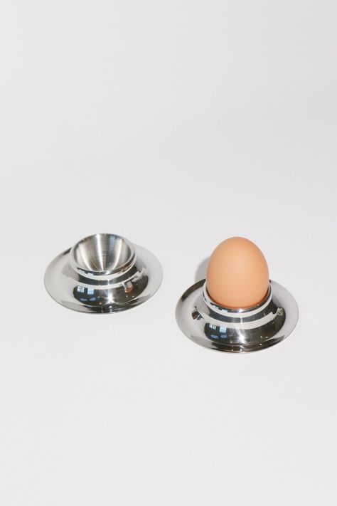 Simple stainless steel egg cups, a chic accessory for any breakfast setting. This stackable design features a functional spoon rest and is highly durable and scratch resistant. Sold as a set of 2. Dinner Party Tablescapes, Short Glass, Food Accessories, Spoon Holder, Interior Design Boards, Kitchen Dinnerware, Egg Holder, Egg Cups, Body Brushing