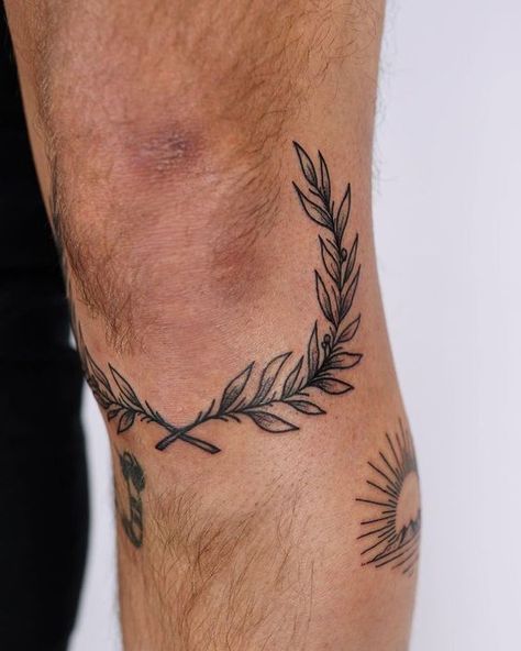 Tattoo Ideas For Men Unique Tattoo Ideas For Men, Laurel Tattoo, Laurel Wreath Tattoo, Tattoo Knee, Voodoo Doll Tattoo, Wreath Tattoo, Unique Tattoo Ideas, Doll Tattoo, Elbow Tattoos