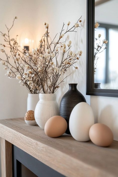 If you want to decorate your house for Easter but are on a strict budget, then try out some of these tips and decor ideas to create statement pieces in your home. Spring Decor Aesthetic, Spring Decorating Ideas For The Home, Easter House Decor, Easter Decor Modern, Neutral Spring Decor, Natural Easter Decor, Easter Home Decor Ideas, Neutral Easter Decor, Simple Easter Decor