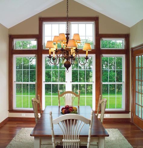 The curbside appeal and overall ascetics that windows provide is unmatched and can brighten your home both inside and out. Windows With Wood Trim, Wood Window Trim, Window Options, Stained Trim, Vinyl Replacement Windows, Awning Windows, Dark Trim, Vinyl Windows, Oak Trim