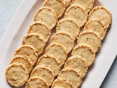 Blue Cheese and Walnut Crackers Recipe | Ina Garten | Food Network Blue Cheese Crackers, Roasted Shrimp Cocktail, Cheese Wafers, Cheese Logs, Homemade Cheese Crackers, Cheese Spreads, Savoury Crackers, Cheesy Appetizer, Thanksgiving Entertaining