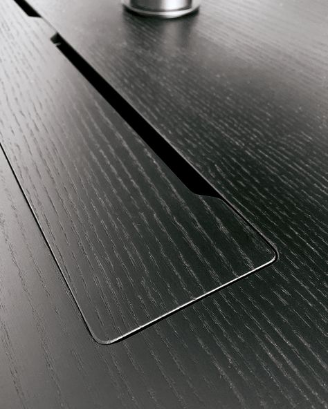 In the research work carried out by the R&D team, attention to detail plays an important part, which characterize and diversify each of our collections. The cable gland available in the Connect tables and Connect console is made up of a steel basket that houses the multi-sockets and a magnetic cover in the same finish as the table top. In the photo, detail of the cable gland in a Connect bench with black ash top. Fur Furniture, Desk Grommet, Cable Grommet, Marble Desk, Hide Wires, House Shed, Black Ash, Meeting Table, Home Office Setup