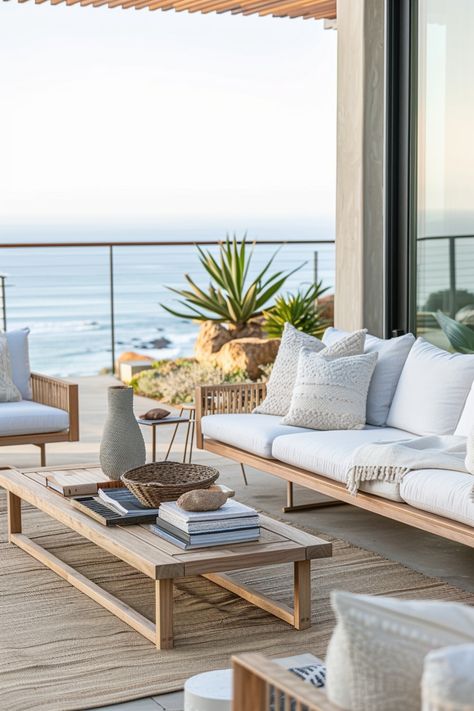 Explore 31 casual modern coastal garden decor ideas. Create a relaxed, beachy vibe with soft blues, sandy neutrals, and white accents. Incorporate natural materials like wicker, rattan, and driftwood. Use light, breezy fabrics, coastal-themed accessories, and nautical touches. Design a serene, inviting space that captures the essence of laid-back coastal living. Australian Decor, Serene Home, Sleek Coffee Table, Coastal Garden, Seaside Hotel, Modern Coastal Decor, Sophisticated Bedroom, Minimalist Sofa, Home Themes