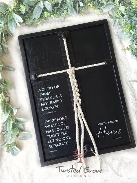 "Custom braid cross, framed unity wedding sign, also know as God's knot, 'Eccl 4 12', 'Mark 10 9', or 'A cord of three strands', 'What God joined together', is the perfect non traditional alternative for your unity ceremony in placement of the unity candle, unity sand ceremony. It is a fitting piece to have at your vow renewal ceremony or anniversary! It is also the perfect Wedding gift, Anniversary gift, Valentines Day gift or simply a couples gift for Christmas. It symbolizes the bonding of Ma