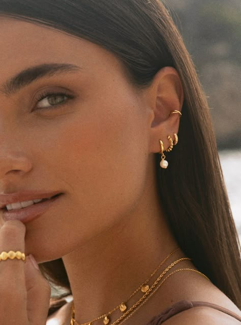 A pearly look ✨ Made of 925 Sterling Silver and 18K Gold Plating, they will become your favourite Gold earrings.💖 Simple Gold Earring Stacks, Multiple Ear Piercings Classy, Gold Earrings Piercings, Three Piercing Stack, Silver Earring Stacks, Ear Jewelry Aesthetic, Silver Piercings Ear, Classy Piercings, Earring Piercing Ideas