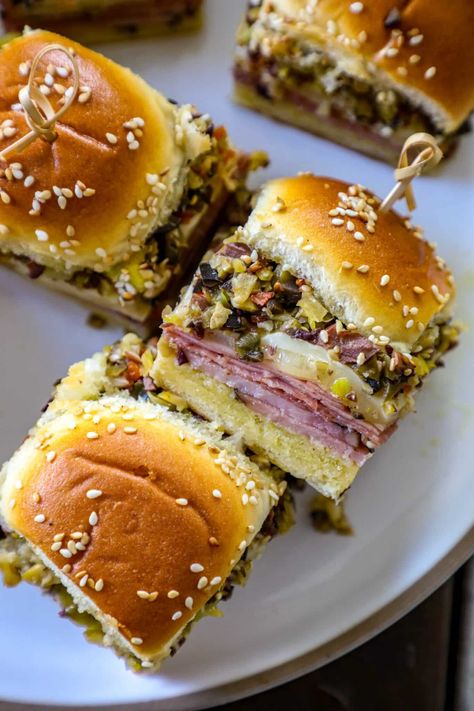 Muffuletta Sliders Muffuletta Sliders, Muffaletta Olive Salad Recipe, Muffuletta Recipe, Sandwich Sliders, Muffaletta Sandwich, Roll Sliders, Muffuletta Sandwich, Hawaiian Roll Sliders, Hawaiian Roll