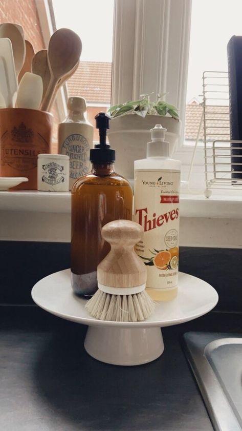 I wanted a stand to store the soaps in the kitchen and decided I would make one on a budget. I found the pieces in a dollar store and it took less than five minutes to assemble! These are the pieces I found; a small plate and a ramekin dish. They cost less than £1 each and were the perfect shape for what I was looking for. First I removed the labels and measured points on the bottom of the plate for the dish to be placed centrally. I marked the points with a sharpie so that I could… Kitchen Sink Soap Tray Ideas, Soap Stand Kitchen, Diy Pedestal Stand, Old English Kitchen, Kitchen Soap Tray, Dish Soap Tray, Diy Pedestal, Diy Dish Soap, Kitchen Sink Soap