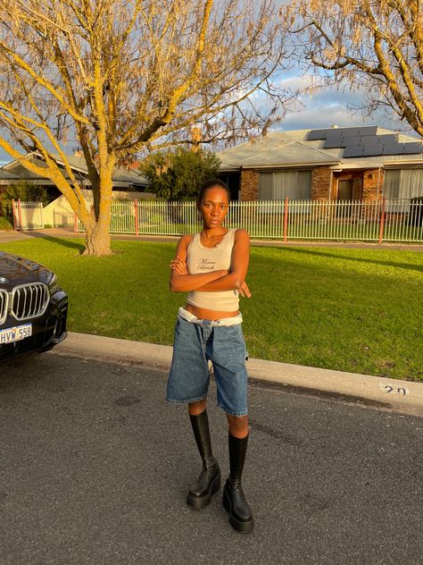 Oversized denim jorts, knee length black boots, pinterest aesthetic, green singlet top, casual style, ootd Boots Summer Outfit, Style Inspo Casual, Knee High Black Boots, Denim Jorts, Singlet Tops, Aesthetic Green, Black Knee High Boots, Pinterest Aesthetic, Top Casual