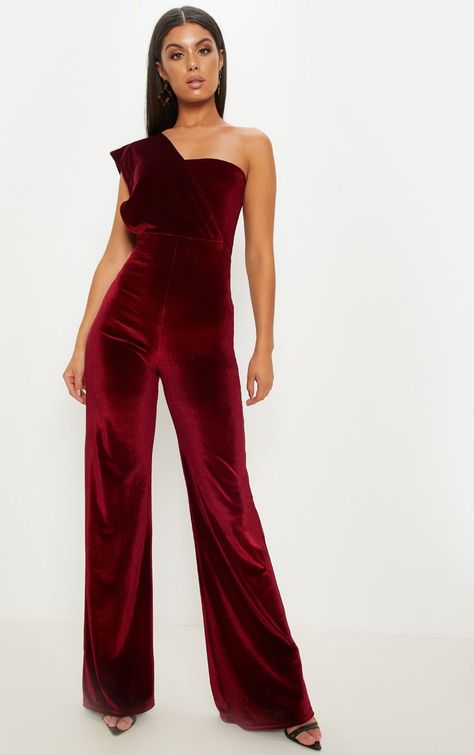 Burgundy Velvet Drape One Shoulder JumpsuitGet that party-ready look with this velvet jumpsuit. Featuring a burgundy velvet material, a drape one shoulder strap and a wide leg fit, just add some strappy heels and tortoise shell Drape Jumpsuit, Red Velvet Jumpsuit, Velvet Drapes, Velvet Jumpsuit, One Shoulder Jumpsuit, Halloween Costume Outfits, Velvet Trousers, Custom Drapes, Burgundy Velvet