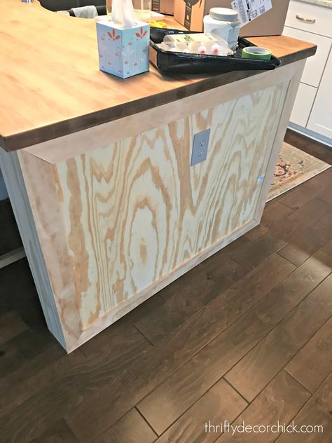 Build out a kitchen island with side panels | Thrifty Decor Chick Kitchen Island Side Panels, Kitchen Island Paneling Ideas, Kitchen Island End Panels, Kitchen Island Ends, Rustic Table And Chairs, Diy Island, Plain Kitchen, Kitchen Island Makeover, Diy Storage Rack