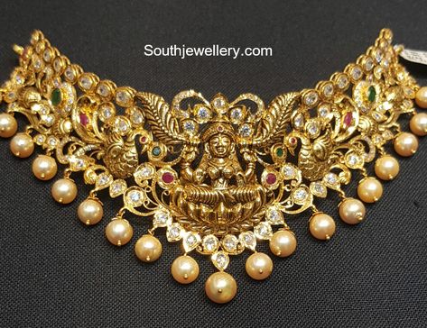 22 Carat gold Lakshmi peacock choker adorned with uncut diamonds, rubies and south sea pearls by Sri Mahalaxmi Jewellers & Pearls. Lakshmi Devi, Gold Temple Jewellery, Gold Bridal Necklace, Antique Necklaces Design, Choker Necklace Designs, Indian Bridal Jewelry Sets, Choker Designs, Gold Jewelry Simple Necklace, Beautiful Gold Necklaces