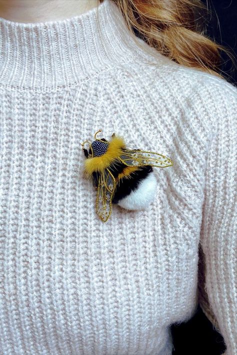 A cute brooch in the shape of a bee is a wonderful gift for a loved one. A bright bee-shaped bead accessory is always a pleasant surprise for a woman. The bee brooch is a symbol of hard work and perseverance. The bee brooch can be worn on a hat or dress. It will look really good. *** Brooches size 7 x 5 cm (2.76 x 1.97 inches) Cute Brooch, Velvet Revolver, I Love Bees, Beaded Spiders, Bee Dress, Bee Pin, Bee Embroidery, Bee Jewelry, Bee Brooch