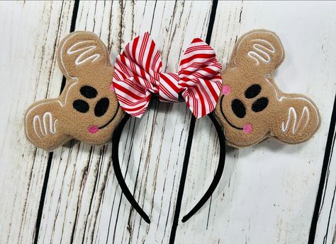 Gingerbread Mickey Ears with a peppermint swirl bow🎄 Check them out at CharlottesAllEars.Etsy.com #disney #disneylife #disneyland #disneygram #charlottesallears #mickeyears #mickeyearsforsale #minniemouseears #disneyears #disneyig #etsyshop #etsysellersofinstagram #disneymickeyears #customdisneyears #lovedisney #disneyearsforsale #magickingdom #wdw #magicalmaker #supportthemagic #supportsmallbusiness #handmadeears #wdw #christmas #disneychristmas #christmasdisney #gingerbreadmickey Wdw Christmas, Disney Mickey Ears, Gingerbread Cookie, Minnie Mouse Ears, Disney Life, Disney Ears, Mickey Ears, Disney Christmas, Magic Kingdom