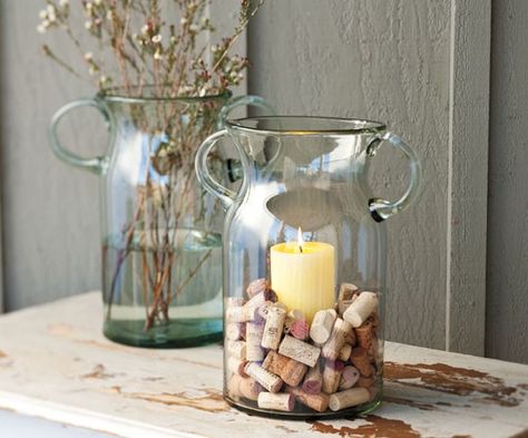 decorative cork vase. easy diy idea. you can buy corks or i got mine from my husband's restaurant. drop into anything from a mason jar to a hurricane vase. Wine Cork Candle, Cork Candle, Napa Style, Wine Cork Projects, Wine Cork Art, Cork Projects, Wine Bottle Corks, Wine Craft, Cork Art