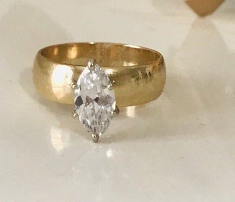 Vintage 10 K Gold Engagement Ring, 1 Carat ZC Marquise Cut Ring, Women's Ring, Zirconia Faceted Ring, Gift for her, Estate Jewelry, Size 7 You are looking at gorgeous Marquise 10 K gold Cz engagement ring, wedding band, or anniversary. The ring features a 10 x 5 mm (1 Carat) brilliant Marquise cut. Top quality AAA Cubic Zirconia display amazing enriched clarity just like real diamonds! This gorgeous ring sparkles a lot!! size: 7 stone size: 10 mm x 5 mm the height of the setting: 7 mm weight: 5. Vintage Ballerina Engagement Ring, Thick Gold Band Marquise Diamond, Marquise Engagement Ring Thick Gold Band, Emrata Engagement Ring, Gold Engagement Ring With Thick Band, Chunky Gold Band Engagement Ring, Vintage Ring Setting, Smooth Engagement Ring, Punk Engagement Rings