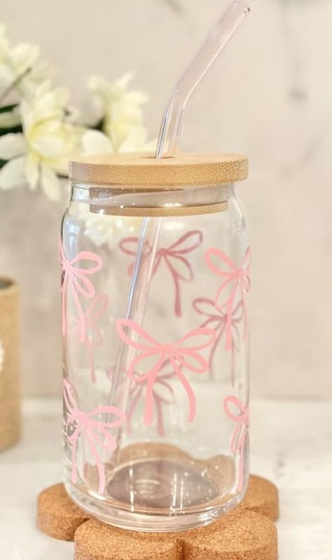 These are super fun. And sooooo adorable!! They are 16oz glass cups that come with a bamboo lid and plastic straw . I now have these in clear, frosted and holographic sparkle cups!  They make amazing gifts! Glass Bottle With Straw, Cute Pink Water Bottle, Cute Aesthetic Water Bottles, Girly Birthday Gifts, Cadeau Aesthetic, Pink Things Aesthetic, Pink Stuff Girly, Cute Water Bottles Aesthetic, Glass Vase Aesthetic