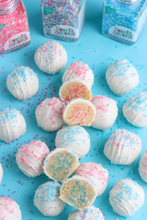 Shop all things blue and pink for baby! Our newest baby shower themed gender reveal baking supplies launch is ideal for upcoming gender reveal parties, baby showers, and sip and sees. Here are a few dessert ideas to celebrate that new bundle of joy! #babyshower #genderreveal #babyshowerdesserts Gender Reveal Cake Balls, Gender Reveal Oreo Balls, Gender Reveal Snack Ideas Desserts, Gender Reveal Sweets Table Ideas, Pink And Blue Treats, Gender Reveal Sweets Ideas, Whats The Scoop Gender Reveal Cake, Gender Reveal Snack Ideas Finger Foods, Gender Reveal Treats Sweets