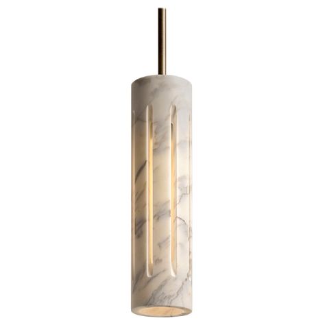 Aura is a contemporary reinterpretation of the ancient outdoor lantern. Masterfully carved from a single block of Calacata Borghini marble, Aura is both a lighting fixture and a sculpture. Vertical cuts on the cylindrical surface allow light to pass through the interior of the sconce while the translucency of the marble evokes transcendence and spirituality. When the lamp is off, Aura becomes a sculpture and displays all the vivid colors and complexity of an extraordinary stone. Also available in white carrara, green guatemala, and nero marquina. Borghini Marble, Modern Lanterns, Outdoor Lantern, Lighting Trends, Suspension Light, Outdoor Lanterns, Carrara Marble, Lantern Lights, Furniture Lighting