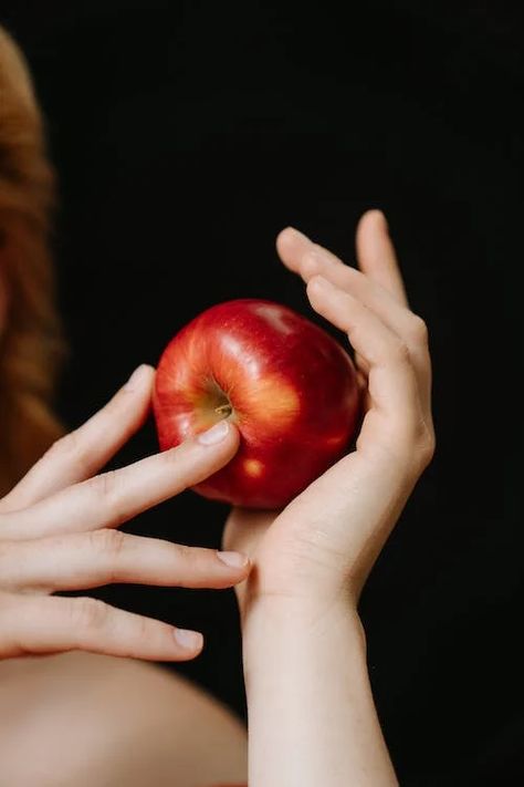 Person Holding Red Apple Fruit · Free Stock Photo Holding Apple Reference, Apple Reference, Exocrine Gland, Holding An Apple, Apple Square, Fruit Crush, Apple Benefits, Hygiene Care, Light Study