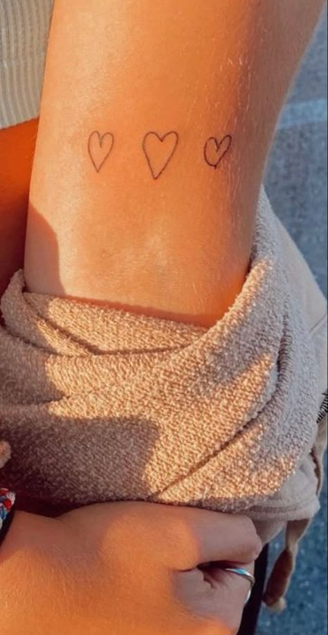 Three Hearts Tattoo Wrist, Cluster Of Hearts Tattoo, Tattoo Around Arm, Friendship Tattoo, Tattoos Tiny, Around Arm Tattoo, Heart Tattoo Wrist, Tattoo Tiny, Tiny Heart Tattoos