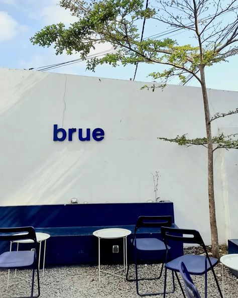 at Brue #brue #blue #cafe Cafe Design Outdoor, Blue Cafe Interior, Blue Cafe Aesthetic, Coffee Shop Design Outdoor, Blue Coffee Shop, Coastal Cafe, Blue Moodboard, Ads Agency, Cafe Exterior