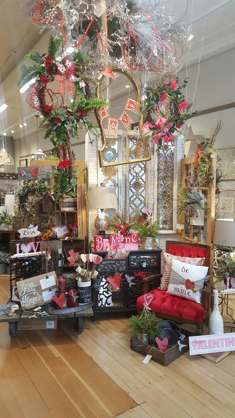 Valentines day decor display idea. Colorful vintage chair accents the theme well. @magnoliasne Whimsical Booth Display, Valentine Store Window Display, Valentines Store Display, Valentines Booth Ideas, Valentine Booth Display Ideas, Valentines Display Ideas, Valentine Display Ideas Retail, Valentine Window Display Ideas, Valentines Booth