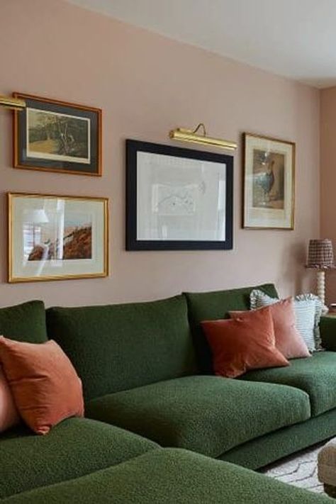 Peach And Green Living Room Decor, Light Green Couches Living Room, Peach Walls Living Room Ideas, Pale Pink And Green Living Room, Pink Sofa Wall Colour, Green Couch Accent Wall, Green Couch With Pink Pillows, Pink And Green Victorian Living Room, Wall Color Green Couch